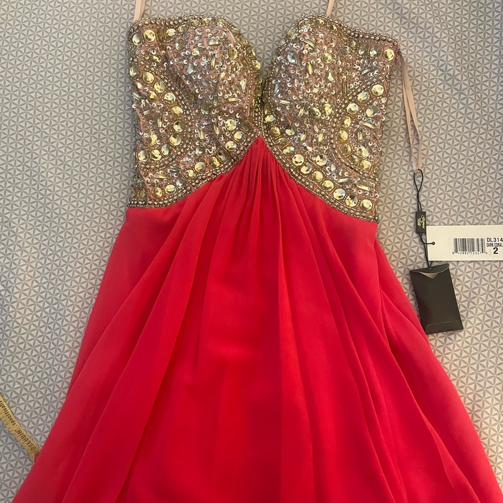 Glamour by Terani Couture Dark coral dress with gold embellished bodice